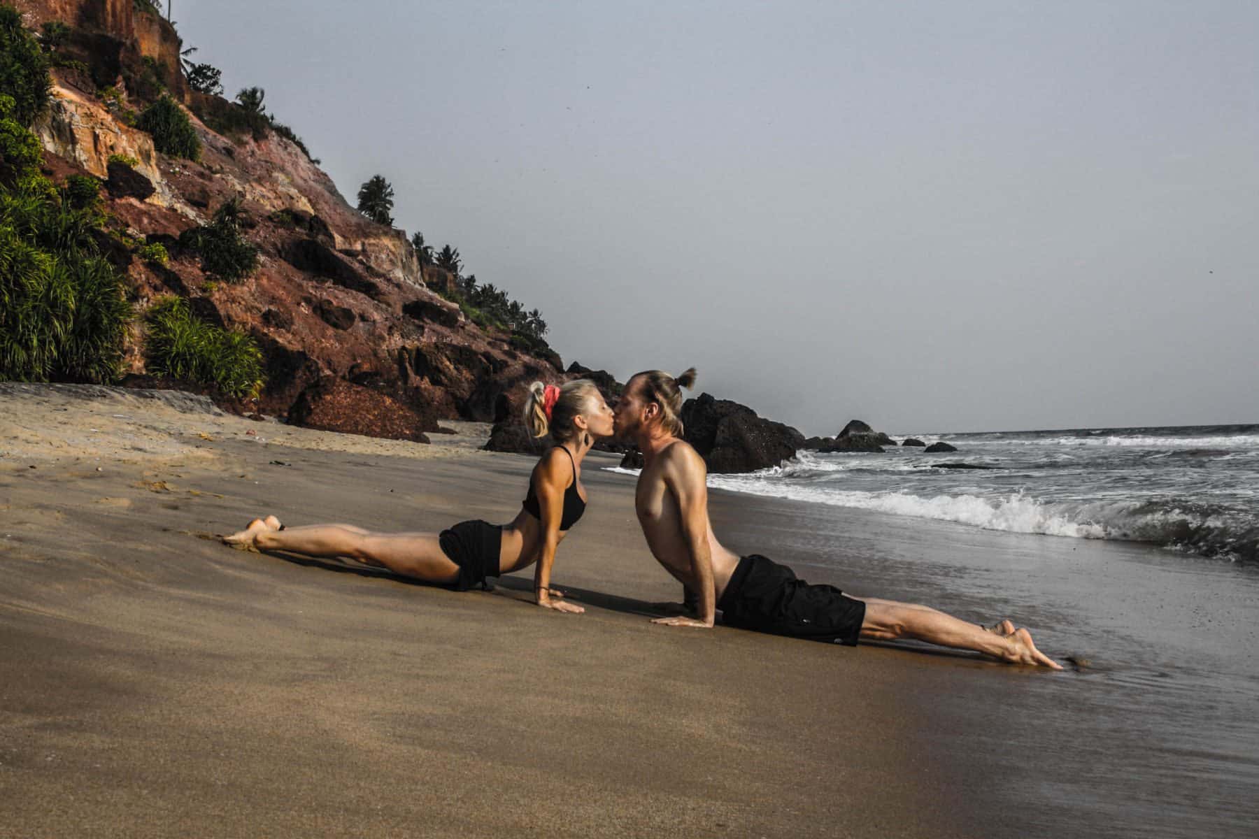 partner-yoga-double-updog-kissing-varkala-beach-kerala-india
