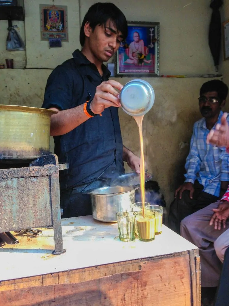 Mumbai Chai wallah serving his customers