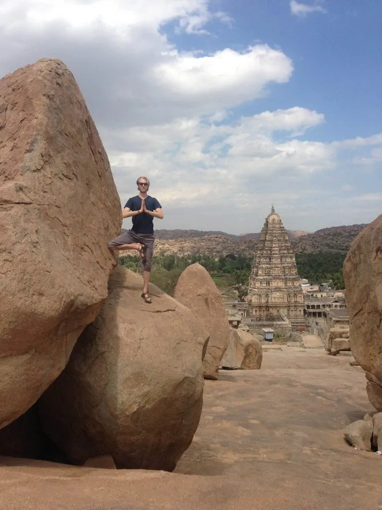 tree pose with prayer hands - Hampi India