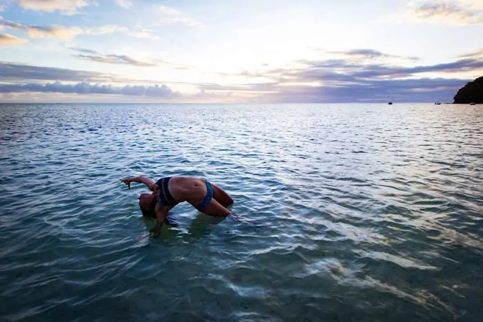 wildthing-yoga-pose-ocean-erica-yogatrade