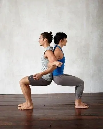 Partner Up: Explore 15 Best And Easy 2 Person Yoga Poses! 2 person yoga poses 18 double chair