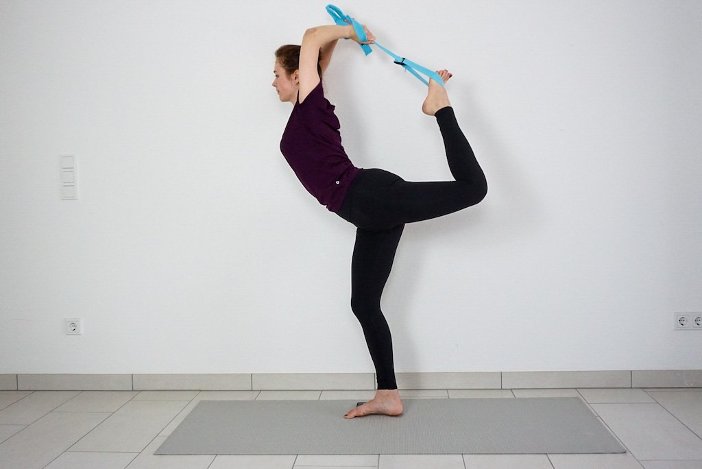 How to Use a Yoga Strap: 7 Yoga Strap Stretches and Benefits - The Yoga  Nomads