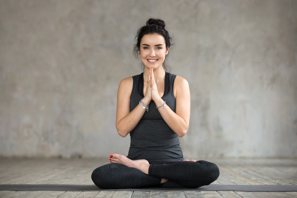 Woman practicing advanced yoga in the living room Stock Photo by  ©glazunofoto@gmail.com 161269636