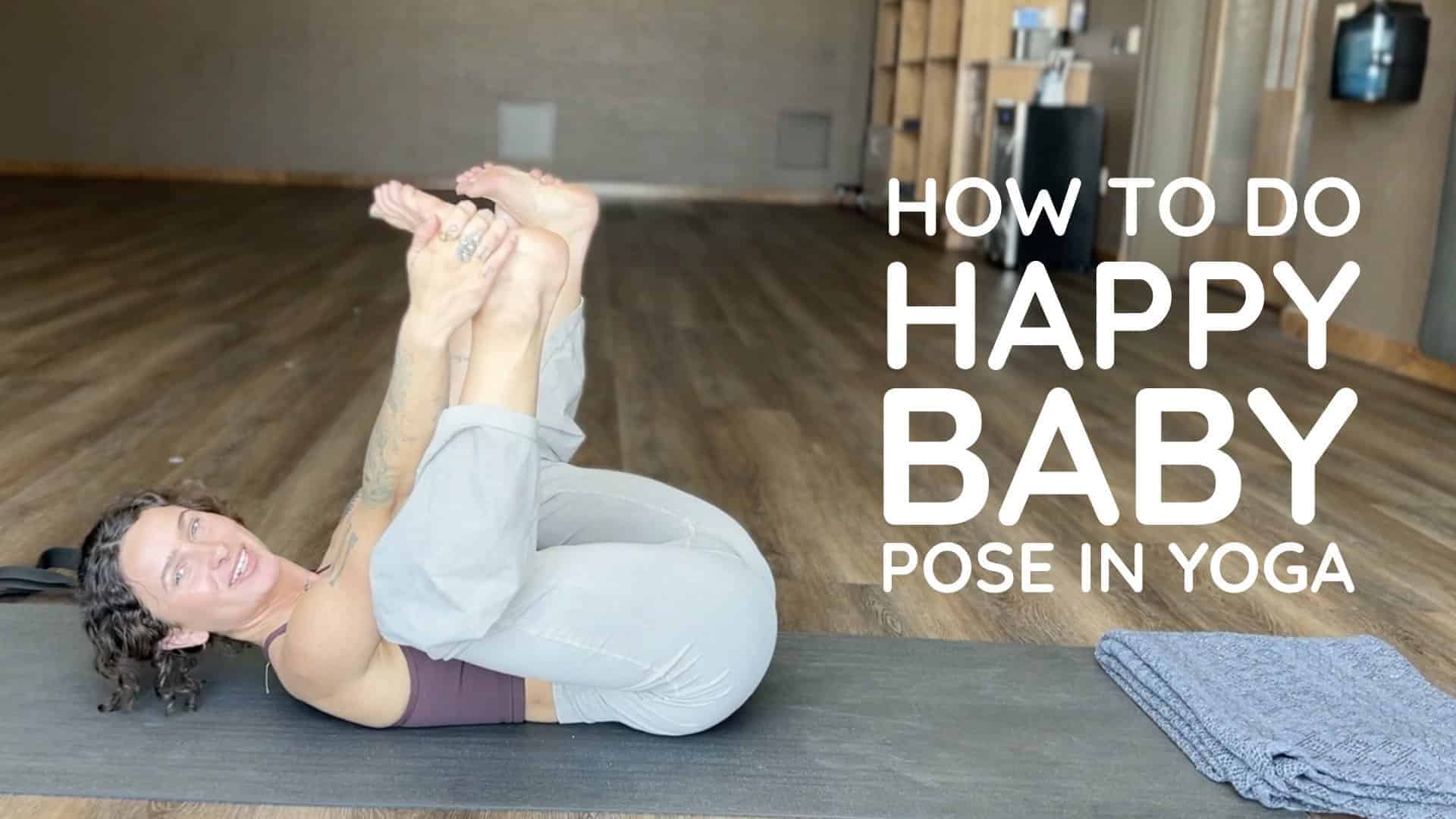 Side view of fit slim yogi girl in Happy Baby yoga pose. Yoga studio  interior. Stock Photo | Adobe Stock