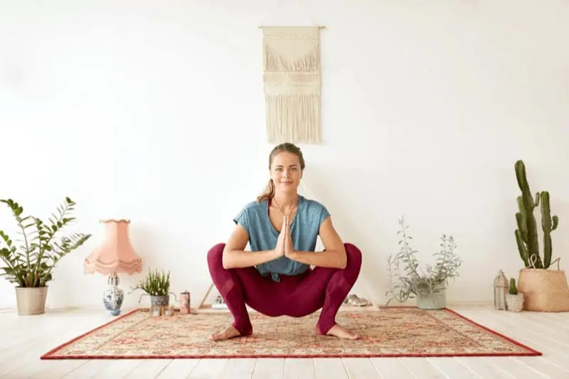 With consistency and practice, the deep squatting position of Prayer Pose will become easier, opening your hips and inner thighs.