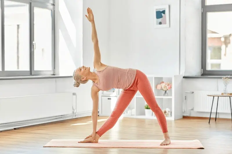 Triangle Pose (Trikonasana) is a classic Hatha yoga posture that provides many physical, mental, and energetic benefits.