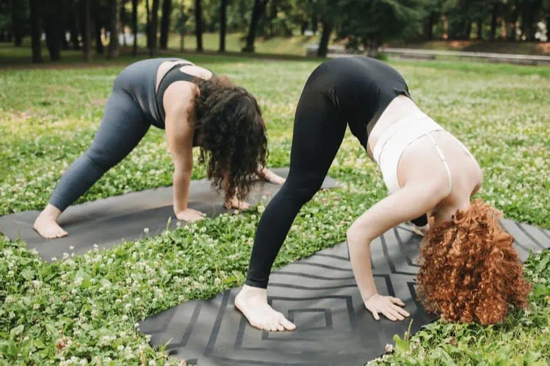 Honor your body when practicing Prasarita Padottanasana. You might not be able to reach your ankles, and that's totally ok!