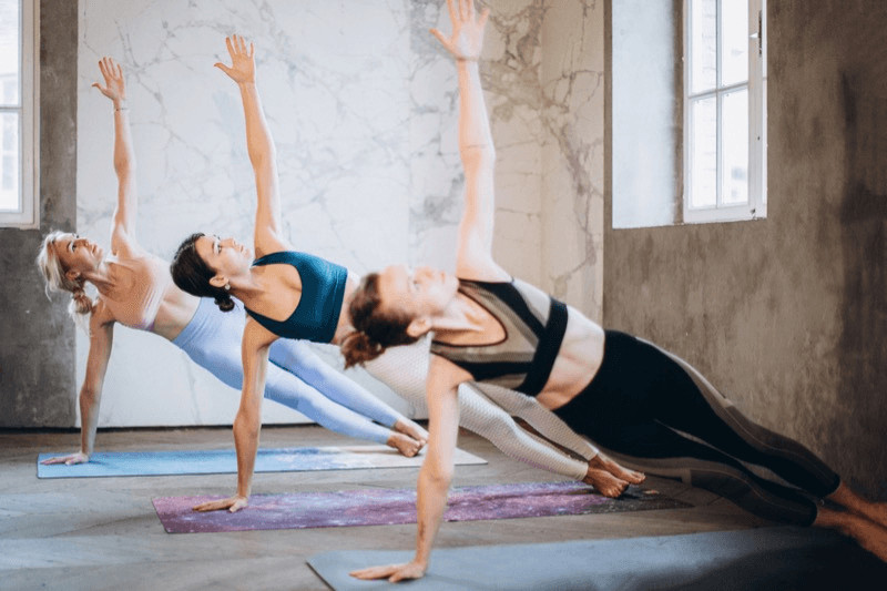 Side Plank Pose builds core strength in your abdominal muscles and outer hip, building stability needed for balance.