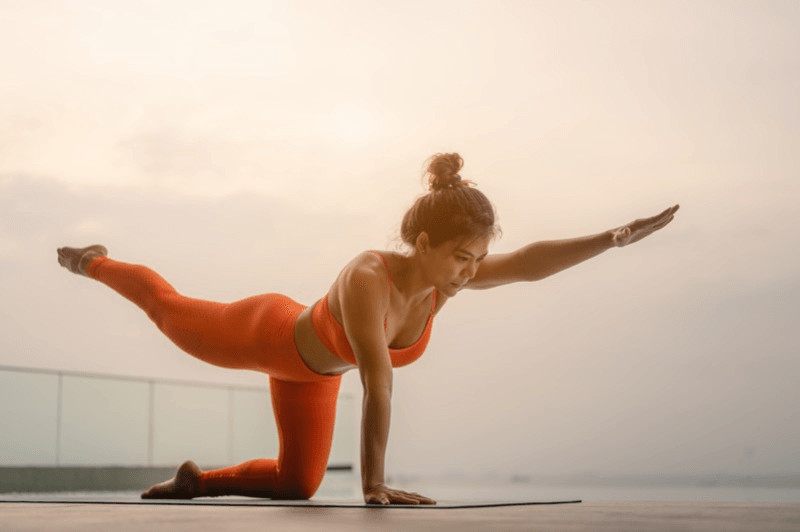 From Table Top, extend one arm and the opposite leg to create an asymmetrical pose, building core strength.