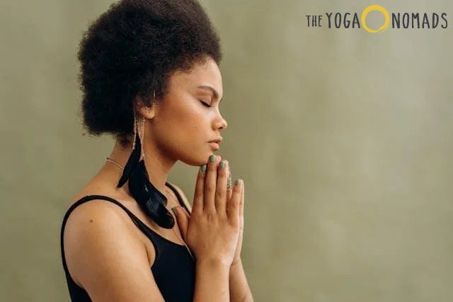 Weekend Warrior’s Guide: Balancing Intense Sports with Yoga Recovery Balancing Intense Sports with Yoga Recovery 4 A woman meditating with her eyes closedÂ